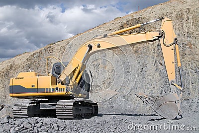 Large Bulldozer Excavator With Rocks Stock Photo