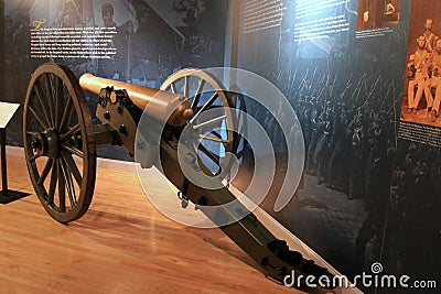 Large canon next to displays covering the war, Military Museum, Saratoga Springs,New York,2016 Editorial Stock Photo