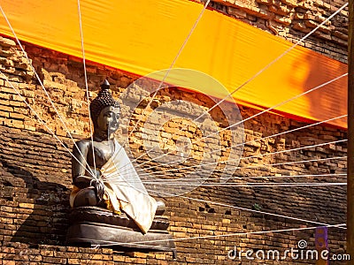 The large chedi Wat Lok Moli It is not known when the temple was built but it is first mentioned in a charter in 1367 CE. The Stock Photo