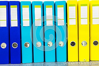 Large color folders for documents on the table in office, copy space Stock Photo