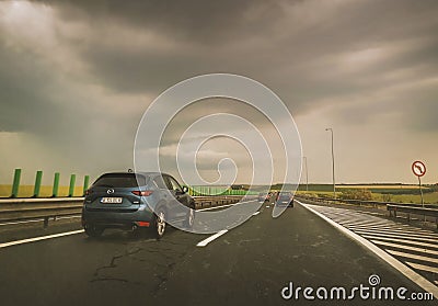 Large congestion and stormy weather on the highway of the sun in Romania Editorial Stock Photo