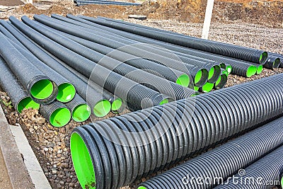 Large corrugated PVC pipes for drainage Stock Photo