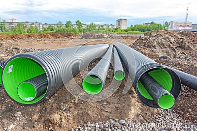 Large corrugated PVC pipes for drainage Stock Photo