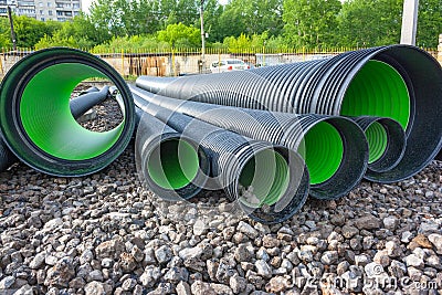 Large corrugated PVC pipes for drainage Stock Photo