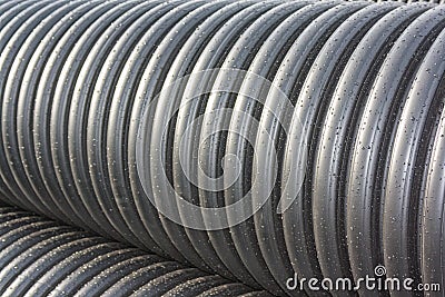 Large corrugated PVC pipes for drainage Stock Photo