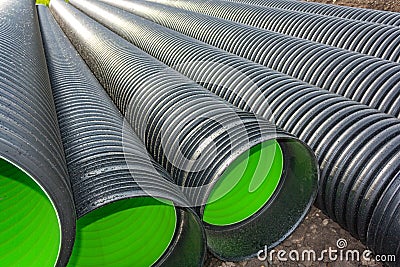 Large corrugated PVC pipes for drainage Stock Photo