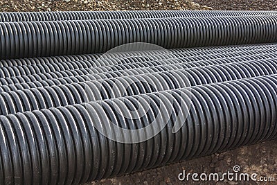 Large corrugated PVC pipes for drainage Stock Photo