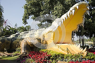 Large crocodile statue name Chalawan in public park for people visit Editorial Stock Photo