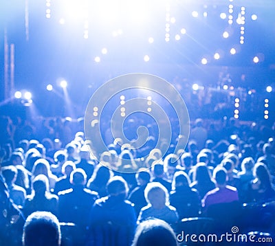 Large crowd of people at bright light Stock Photo