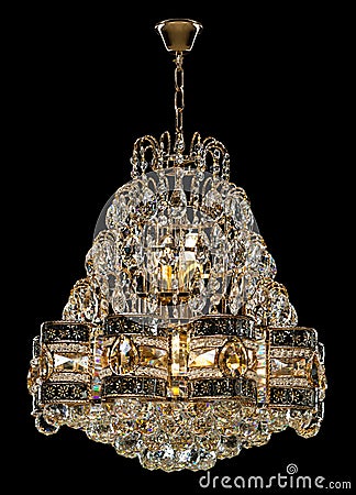 Large crystal chandelier isolated on black background. Stock Photo