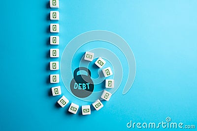 Large debt requires high servicing costs and complicates a dire financial situation. Lending, loans and mortgages. Bad financial Stock Photo