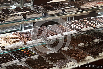 Row upon row of tempting chocolate candy, Kilwin`s, Saratoga Springs, New York, 2018 Editorial Stock Photo