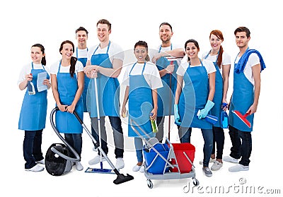 Large diverse group of janitors with equipment Stock Photo