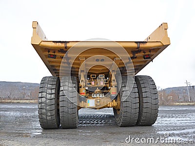 Large dump truck body rear view from the side of the body Stock Photo