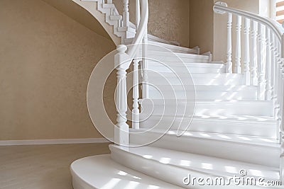 Large, elegant, new, clean, white natural wood stairs in the house Stock Photo