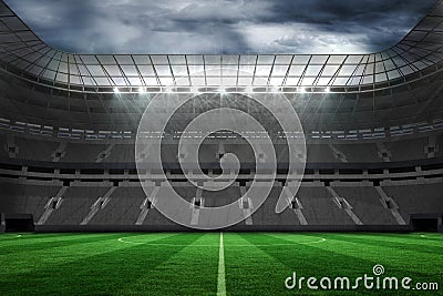 Large empty football stadium with lights Stock Photo