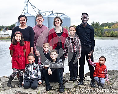 Large Family By Lake Stock Photo