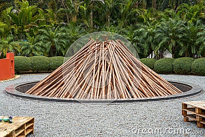 A large firewood campfire built for outdoor camping Stock Photo