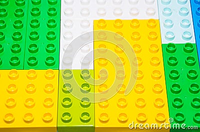 Large foam building blocks for a child's playroom. A pile of multi-colored children's designer with large bricks Stock Photo