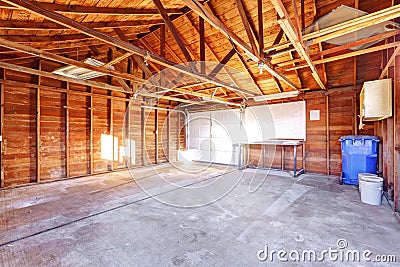 Large garage with concrete floor. Stock Photo