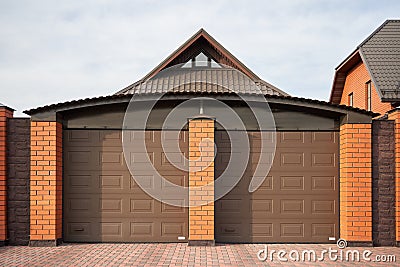 Large garage with rolling door for two cars Stock Photo