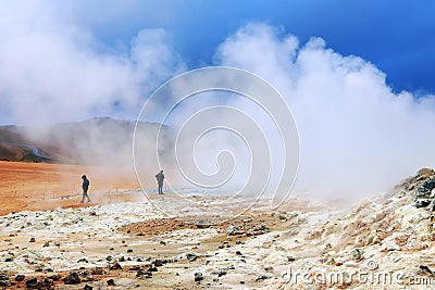 Tourists visiting the Geothermal region of Hverir near Myvatn Lake in Iceland. Editorial Stock Photo