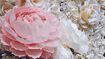 Large Giant bendable Paper Flowers. Big pink roses made from paper. DIY big paper flower made from corrugated paper and EVA Foam Stock Photo