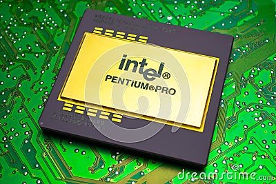 large, gold-plated ceramic processor. intel pentium pro on green PCB. gold recovery and recycling Editorial Stock Photo