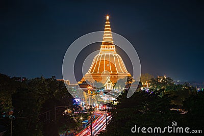 Large golden pagoda Located in the community at sunset , Phra Pathom Chedi , Nakhon Pathom province, Thailand. This is public Stock Photo