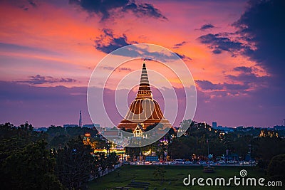 Large golden pagoda Located in the community at sunset , Phra Pathom Chedi , Nakhon Pathom province, Thailand. This is public Stock Photo