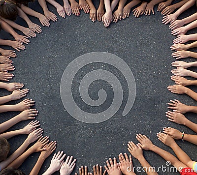 Large Group of Children's Hand Forming a heart shape Stock Photo
