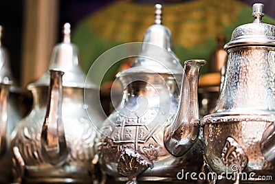 Large group, collection, of silver platted arabic mint tea pots. Stock Photo