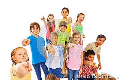 Large group of cute kids pointing at camera Stock Photo