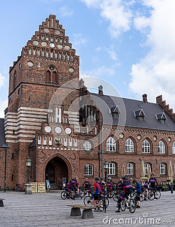 Large group of cyclists from a club meet on the town square of Roskildde for a weekend bicycle trip Editorial Stock Photo