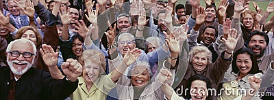 Large group of multi-ethnic people cheering with arms raised Stock Photo