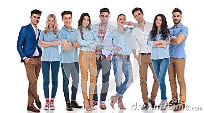 Large group of happy casual men and women standing Stock Photo