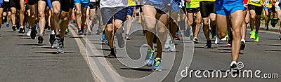 large group runners athletes running marathon Stock Photo