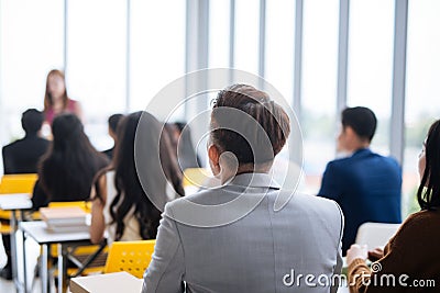 Large group in seminar class room to agree with speaker at conference seminar meeting room. Stock Photo