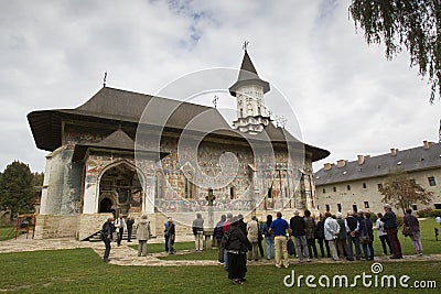 A large group of tourist visit Sucevita Monastery. Editorial Stock Photo