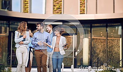 Large group of young businesspeople walking Stock Photo