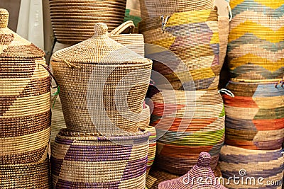 Large hand-made colored baskets in an African market Stock Photo