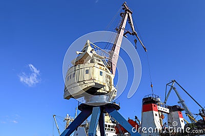 Large harbor crane on the quay Stock Photo