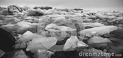 Large icebergs detached from the tongue of a glacier reaching the coast, in Iceland, paradise for adventurers Stock Photo