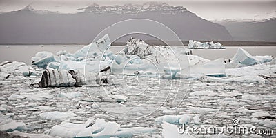 Large icebergs detached from the tongue of a glacier reaching the coast, in Iceland, paradise for adventurers Stock Photo