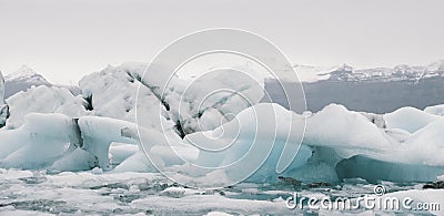 Large icebergs detached from the tongue of a glacier reaching the coast, in Iceland, paradise for adventurers Stock Photo