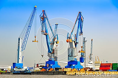 Large industrial cargo cranes in the harbor Stock Photo