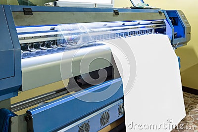 Large inkjet printer head working on white blank vinyl Stock Photo