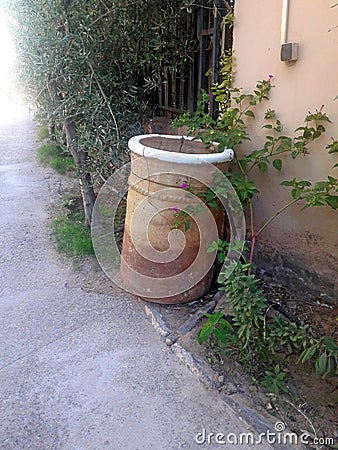 A large jar made from clay used in the past to preserve dates in the Oasis of Figuig Stock Photo