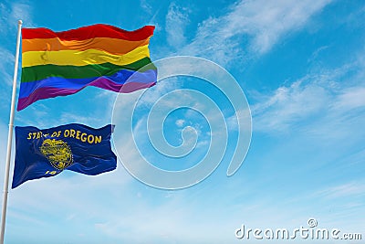 large lgbt flag and flag of Oregon state, USA waving in the wind at cloudy sky. Freedom and love concept. Pride month. activism, Cartoon Illustration