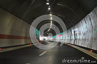 large lighted tunnel and road Stock Photo